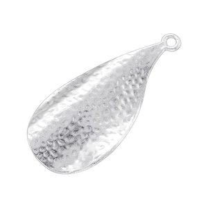 Macro shot of teardrop shaped silver metal pendant with hammered texture and top ring