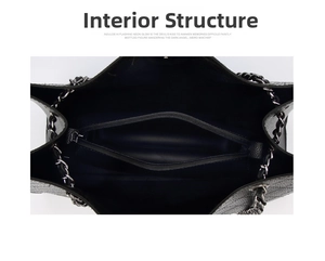 Internal structure of black pebbled leather tote showing the spacious dual compartments