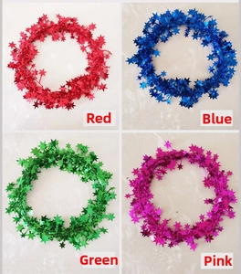 Star-shaped Christmas tinsel garlands in red, blue, green, and rose red for festive decor