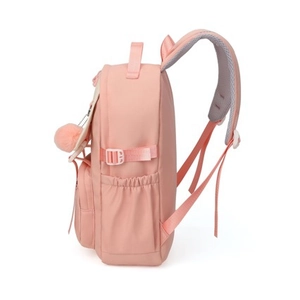 Side view of pink nylon school backpack featuring a decorative plush ball charm accessory