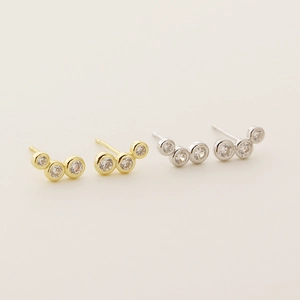 Minimalist S925 silver stud earrings set with curved rows of sparkling clear gemstones