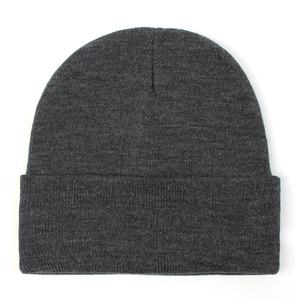 Detailed view of dark grey knitted beanie showing the thick ribbed texture and wide fold
