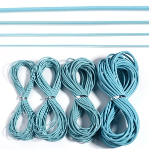 Detail showing four sizes of light blue round cowhide leather cords for DIY jewelry craft