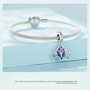 Detail of S925 sterling silver mesh bracelet featuring a gradient lotus flower pendant
