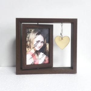 Rotating brown wooden photo frame with a 4x6 inch inner frame and a heart-shaped charm