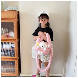 Detailed plush pink children's shoulder bag with a cute teddy bear and floral accents