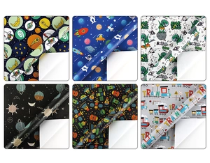 Grid view showing six cartoon gift wrap patterns with space, dinosaur, and train themes