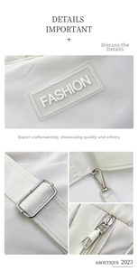 Detail of adjustable metal buckle, sturdy hook, and fashion patch on white tote bag