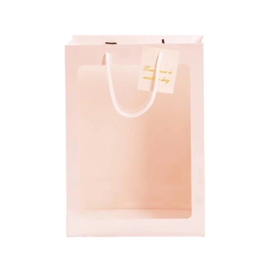 Pink gift bag with transparent window and white handles for flowers or dolls