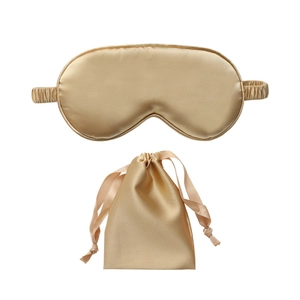 Champagne silk sleep mask set with matching drawstring pouch on white background