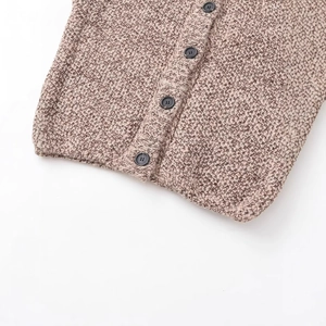 Women's tan chunky knit vest featuring high-quality waffle texture and black buttons