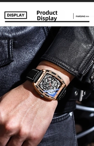 Luminous tonneau quartz watch with rose gold case and black leather strap on wrist