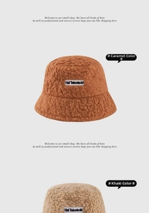 Detailed texture of caramel and khaki sherpa bucket hats with embroidered branding