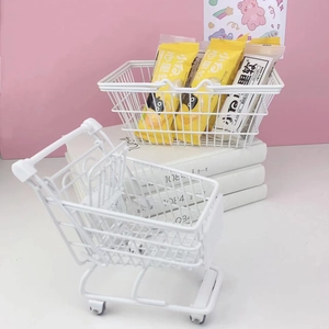 Miniature white metal wire storage basket and shopping cart for desk organization