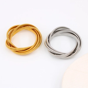 Bracciali a bobina impilati in acciaio inossidabile oro e argento con stile punk minimalista