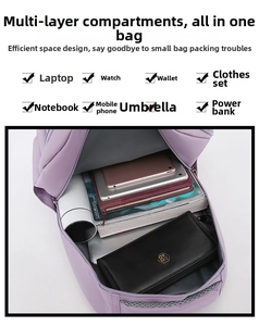 Internal compartments of the purple nylon backpack showing spacious capacity for laptops
