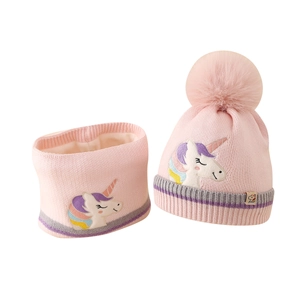 Pink knit children's beanie and scarf set with unicorn embroidery and fluffy pom pom