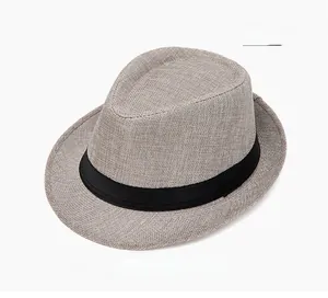 Detailed top view of light gray fedora hat with black grosgrain ribbon and woven texture