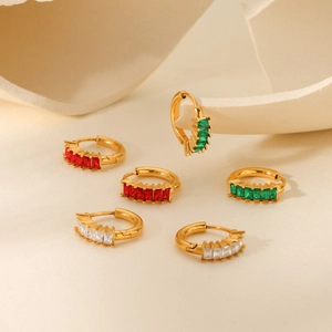 Close-up of 18K gold plated huggie earrings with colorful baguette-cut zircon stones