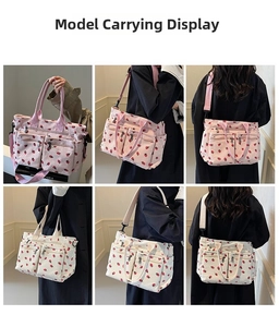 Corduroy shoulder bag with strawberry print and multiple pockets for daily commute