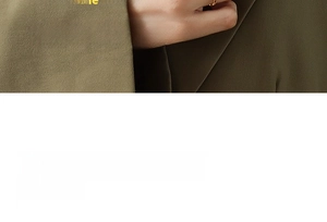 Close-up of a model wearing a minimalist 18k gold plated dolphin pendant necklace for women