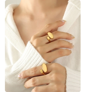 Minimalist gold titanium steel open ring featuring dual oval smooth asymmetric design