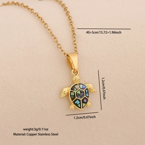Detail view of turtle necklace with abalone shell inlay and dimension measurements
