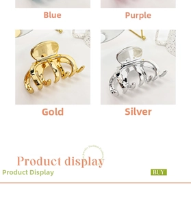 Detail of elegant gold and silver metal hair claws with glossy finish and strong spring teeth