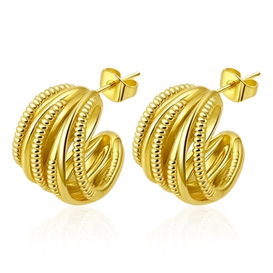 Macro shot of 18K gold plated multi-layer interwoven hoop earrings with beaded textures