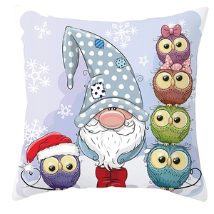 Detailed close-up of Christmas gnome and owls pattern on a square peach skin pillowcase