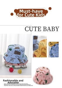 Detail view of cotton sun hats for babies with colorful cartoon dinosaur and tree prints