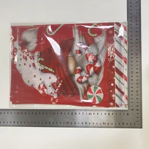 Detailed view of Christmas gnome placemat showing festive pattern and 30x21cm size scale