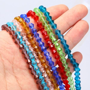 Macro detail of multi-colored bicone crystal glass beads for DIY jewelry making