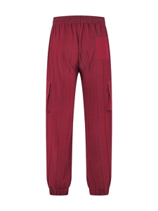 Rear view of red cargo pants showing elastic waistband and detailed checkered texture