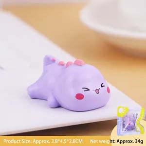 Cute purple mini dinosaur ornament with pink scales for home and office desk decor