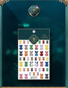 Macro shot of 5D colorful teddy bear nail art stickers with embossed 3D texture details
