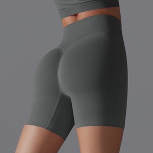Detail of high-waisted seamless dark grey yoga shorts with scrunch butt lift effect