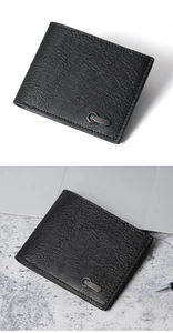 Detail view of men's bifold wallet in black litchi leather with blue stone metal accent