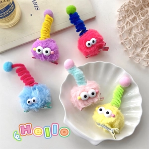 Cute fuzzy monster hair clips in five vibrant colors with big eyes for girls