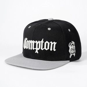 Classic black and grey snapback hat with white Compton 3D embroidery and side badge