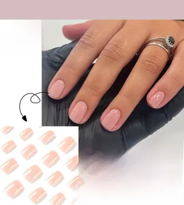 Short nude pink glossy press-on nails set JP2644 displayed on hand and in full set kit