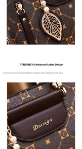 Close-up of luxury brown leather bag showing golden leaf pendant and pearly details