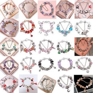 Grid view of various enamel and glass beads bracelets with cartoon charm pendants
