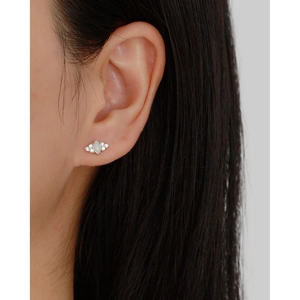 Close-up of s925 silver stud earring with marquise opal and sparkling side stones