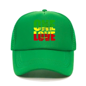 Detail of green mesh trucker hat featuring Rasta color One Love print and foam front