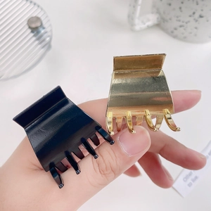 Glossy black and gold alloy hair claw clips for women ponytail styling
