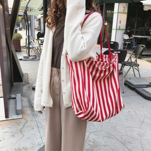 Large capacity canvas tote bag with classic red and white stripes for daily use