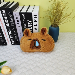Detail view of cute plush capybara pencil case with 3D blue bubble embroidery detail