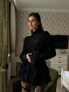 Elegant black lace high-neck dress with lantern sleeves and layered ruffle skirt