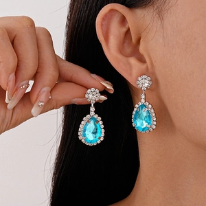 Elegant vintage pear-cut light blue crystal drop earrings with sparkling pavé accents